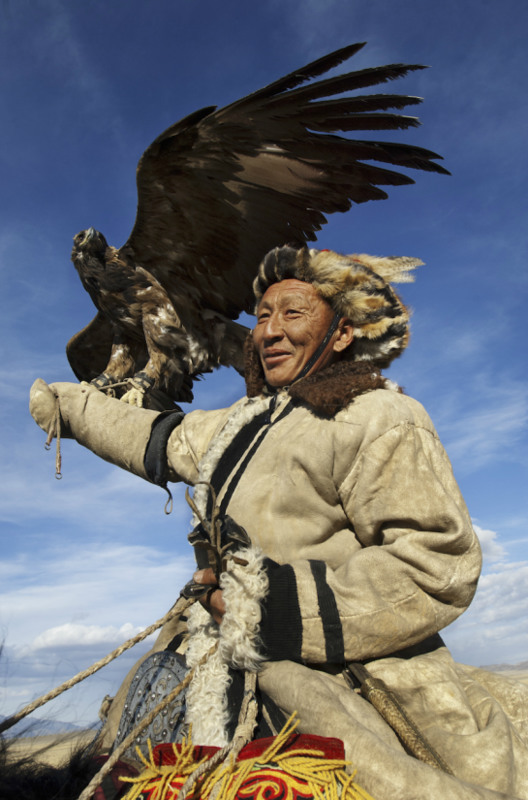 6 Olgii, Mongolia. Kazakh hunter and his eagle.