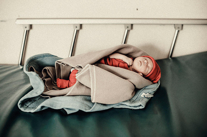 14 Новорожденный малыш в родильном отделении больницы Ла Сейба.