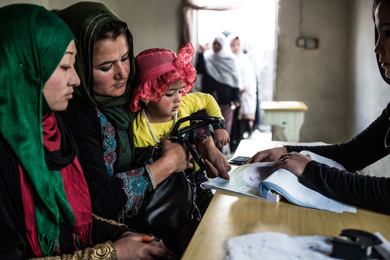 8 Despite Taliban threats and attacks on the presidential election, a woman registered to vote, using her fingerprint.
Bryan Denton for The New York Times. KABUL, AFGHANISTAN
03/26/2014