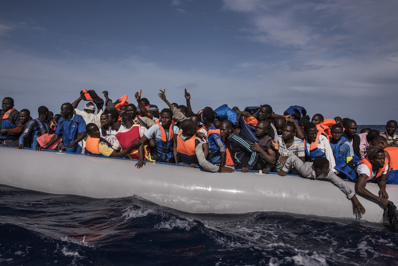 38 Italian sailors rescued African refugees from a rubber boat. Many were fleeing war in their countries.
Lynsey Addario for The New York Times. BETWEEN LIBYA AND ITALY
10/04/2014