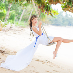 Bride on a swing.