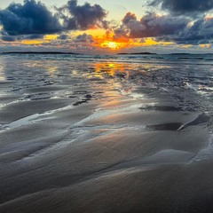 Ocean tide at sunset