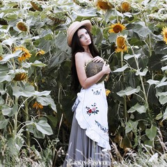 Lady and sunflowers