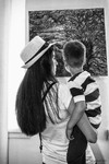 In front of the canvas